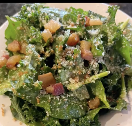 Spinach and kale Caesar salad with pancetta